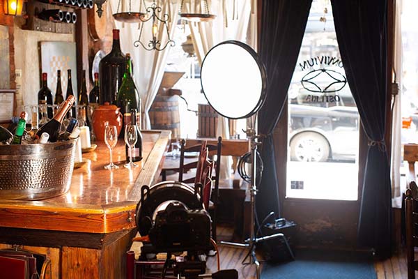 Behind the scenes photograph of a glasses of champaign being photographed