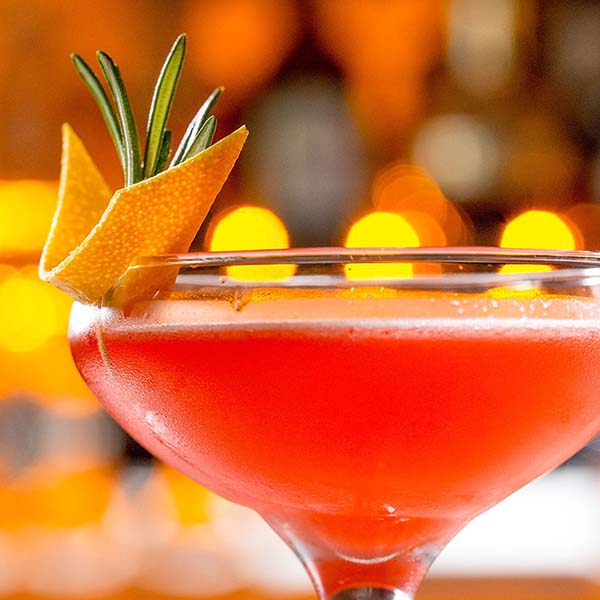 An upclose and personal detail of a cocktail garnish.