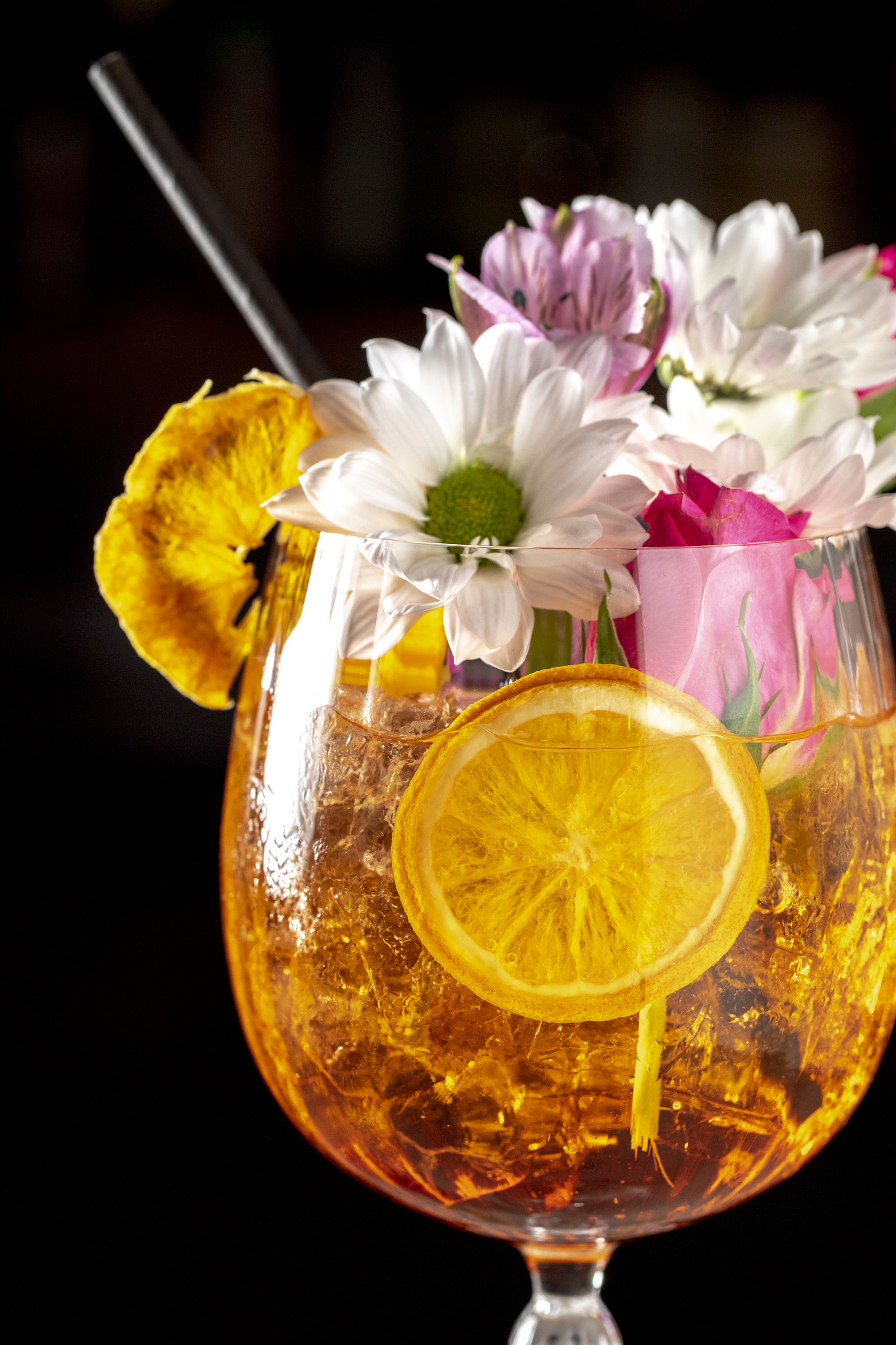 a drink overflowing with flowers