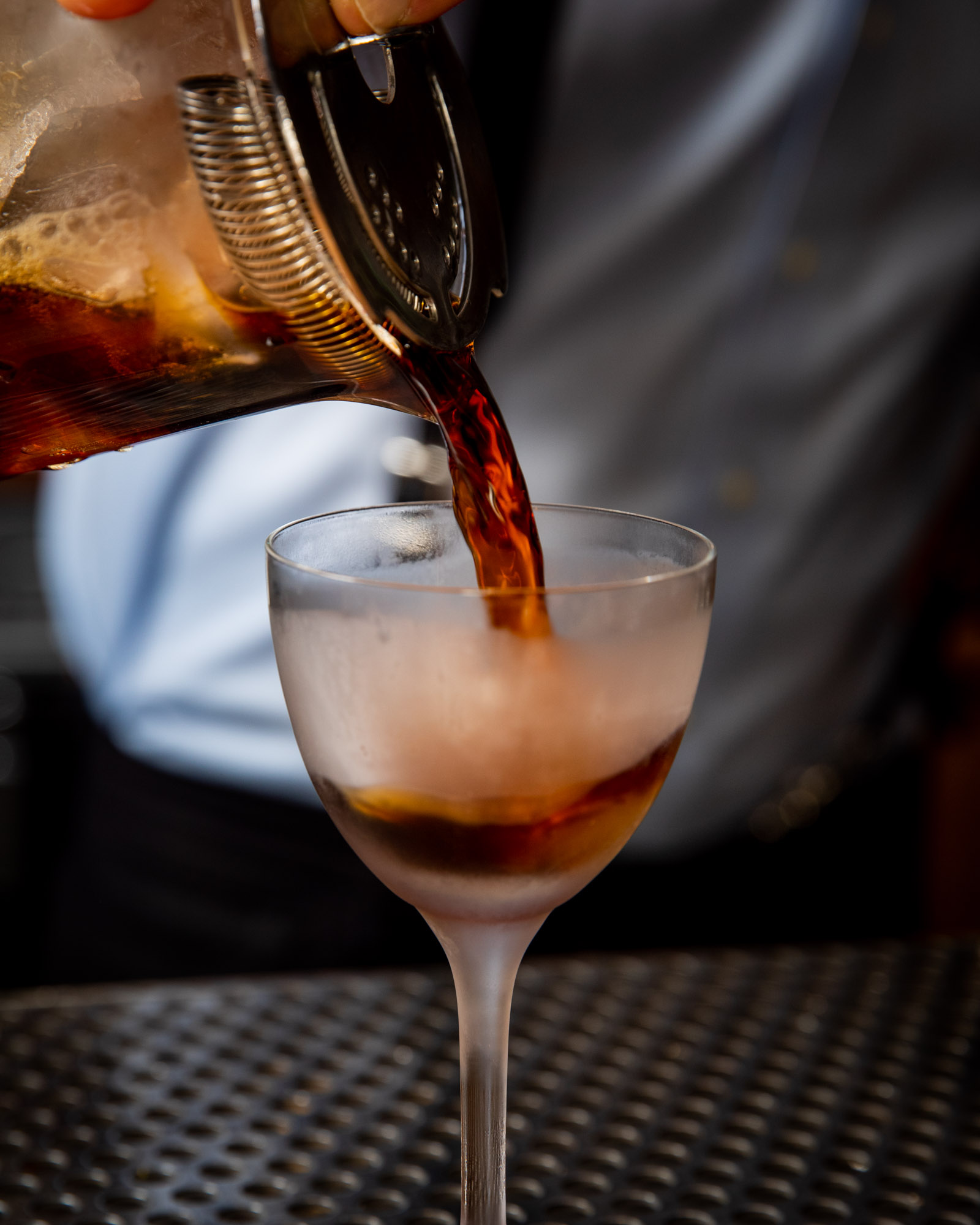 A closeup of alcohol being poured